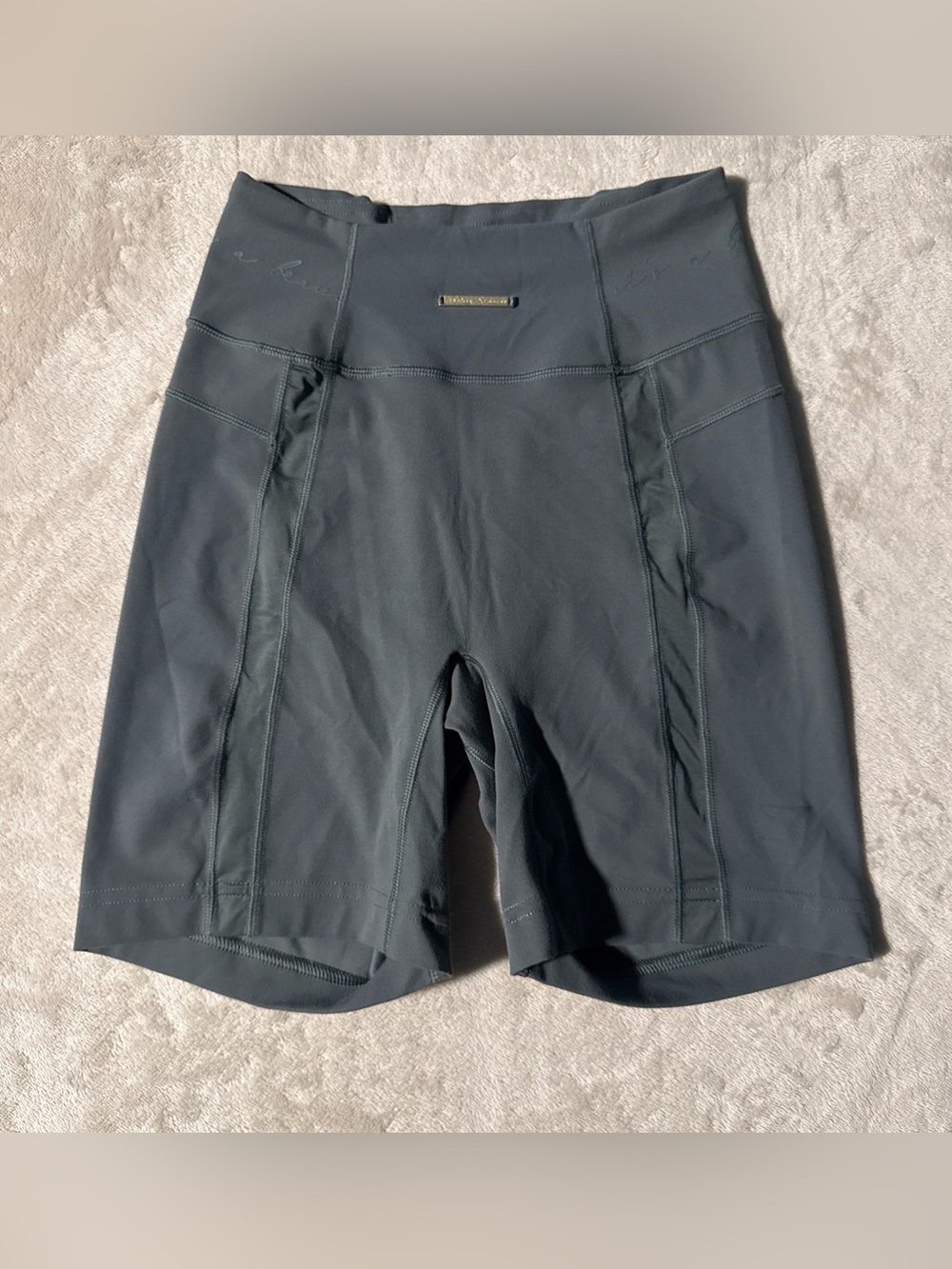 Gymshark High-Rise Bike Shorts in Dark Gray Whitney Simmons